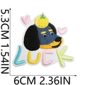 Close-up of dachshund embroidery patch with LUCK text showing detailed thread texture - US 7