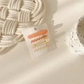 Detail view of 4-piece matte metal hair clips in orange and beige on a display card - 9# Beige Orange