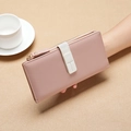 Pink long women's wallet with off-white strap and gold zipper in textured faux leather - Pink
