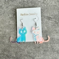 Holografische acryl kattenoorbellen met skeletpatroon en regenboog reflectie-effect - Holografische Skelet Kat