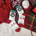 White coral fleece Christmas socks with festive green wreath and red toe accents - White Donut