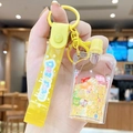 Yellow bubble tea cup keychain with cute bear, floating sequins, and silicone wrist strap - Jelly Squeezer - Yellow