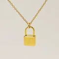 Minimalist gold-plated padlock necklace with cursive letter J engraving on an O-chain - Letter J Style