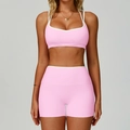 Pink yoga sports set with white contrast piping featuring strappy bra and biker shorts - S / Bra + Shorts / Sakura Pink