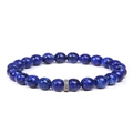 Deep blue natural stone beaded bracelet featuring a textured silver cylinder spacer bead - Sodalite