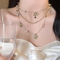 Three-layer gold necklace featuring white pearls, gold bow and vintage heart charm - 71#X3953 (Vintage Heart Bow Three-layer Necklace)