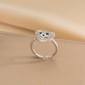 Macro shot of silver bear ring featuring sparkling clear stones and black gem eyes - Bear Ring (Open) / Steel