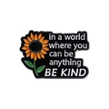 Black enamel pin featuring sunflower and 'BE KIND' quote with metal finish - Be Kind Sunflower (qhxz349)