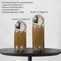 Set van twee kristallen bollen met gouden basis in de maten 27 cm en 22 cm hoog - Grote en Kleine Panfluitstandaard Set