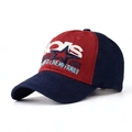 Detail of red and navy cotton baseball cap with intricate white embroidery on front crown - Adjustable / Navy + Red