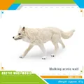 Realistic white arctic wolf model toy in walking pose with detailed fur and blue eyes - Walking Arctic Wolf (BL-1308)