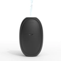 Black diamond facial ice roller being filled with water through the top inlet - Light Oval - Black