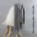 Light heather grey cashmere-feel scarf with tassels on a white chair - Tassel Style / 220g (200x70cm) / Light Heather Grey