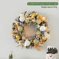 30cm white flocked Christmas wreath with gold balls, beige bow, and warm LED lights - 30cm Gold Wreath With Lights