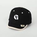 Detail of white towel embroidery letter G on kids black canvas short brim baseball cap - Toddler Size / Black