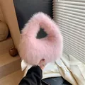 Pink triangle faux fur handbag with fluffy plush texture for autumn and winter outfits - Pink