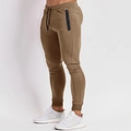 Pantaloni sportivi slim fit da uomo in maglia kaki con tasche a zip e coulisse in vita - S / Cachi