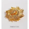 Elegant 6.1cm gold-plated textured sunburst brooch in a minimalist spiral design - Brooch