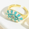 Adjustable gold ring with blue and white enamel evil eye and sparkling center gemstone - Blue