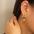 Elegant gold spherical stud earrings with C-shaped metallic loop for women in polished finish - Gold