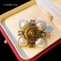 Detail of 4.0cm vintage pearl brooch with Medusa head motif and clear crystal accents - Vintage Medusa Head Style (B1334)