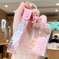 Pink quicksand keychain with flower liquid bottle and LOVE wristlet strap for bags - Jelly Squeezer - Pink