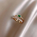 Elegant gold double-layered open ring with green emerald-cut stone and pavé accents - Double Layer Green