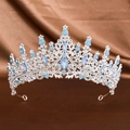 Elegant silver bridal crown featuring shimmering light blue and clear rhinestones - Silver Blue Opal