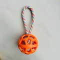 Hollow TPR rubber dog ball with colorful braided rope handle in vibrant orange color - Orange Single Ear Ball