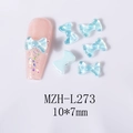 Detalle de lazos decorativos para uñas en resina azul aurora de tamaño 10x7mm - Azul Mocha (L273)