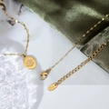 Elegant 18K gold plated titanium necklace with a cute paw print pendant on green silk - Gold