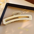 Elegant gold metal hair claw clip featuring rows of white pearls and hollow frame design - Gold Vintage Pearl Frame Claw
