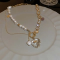 Baroque freshwater pearl necklace with gold chain and transparent heart crystal pendant - Heart Rhinestone Freshwater Pearl OT Buckle Necklace