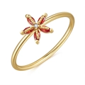 Close-up of gold flower ring with red marquise gems and a central diamond accent - Red Flower