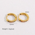 Detail shot of golden huggie earrings featuring multicolored cubic zirconia stones and sizing - 12mm Multi-color Zirconia