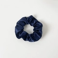 Detailed view of dark blue satin fabric texture on a high-shine hair scrunchie - Without Card / Navy Blue