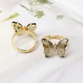 Adjustable golden butterfly ring set with transparent grey crystals and fine diamonds - Smoke Gray