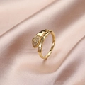 Detailed close-up of golden snake scale texture ring with pavé-set sparkling zircons - Snake Scale Texture (Model A)