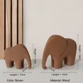 Set of two modern minimalist brown wooden elephant figurines for home shelf decoration - Elephant Brown Pair