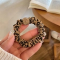 Chic leopard print hair scrunchie with golden crystal ball detail on fingers - Leopard Scrunchie Style / Leopard Rhinestone Bead