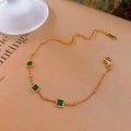 Detailed view of a gold-plated bracelet with three square green gemstones and lobster clasp - 3# Bracelet - Gold-Green-Real Gold Plated