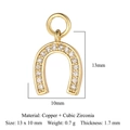 Golden horseshoe charm in copper and cubic zirconia with 13x10mm size specifications - Gold Horseshoe