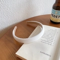 Minimalist wide sponge headband in white fabric finish on a cozy desktop setting - Thickened Padded Fabric Style / White