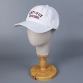 Close-up of white quick-dry nylon baseball cap with brown embroidery detail - M (56-58cm) / White