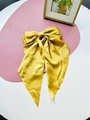 Elegant large yellow satin bow hair clip with long ribbons and smooth silk finish - Mango Yellow