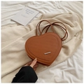 Tan heart-shaped crossbody bag with rabbit embossed pattern and adjustable shoulder strap - Brown