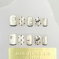 Short round handmade press-on nails in pearl white with 3D bows and black polka dots - By1627 Has Delicate Features / Glue Type