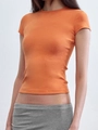 Close-up of bright orange slim fit T-shirt showing round neck and soft elastic fabric - XS / Orange