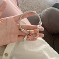 Ocean themed DIY charm bracelet with mermaid and seahorse pendants on spiral band - Ocean Heart Bangle
