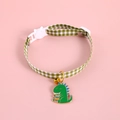 Green plaid pet collar with dinosaur pendant and bell on a pink background - S (17-32cm) / Plaid Dinosaur